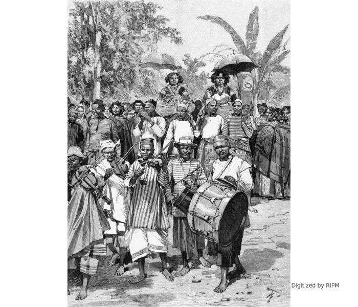 Nossi-Bé. — La reine Binao et sa sœur Kany se rendant en visite à la Résidence à l’occasion du 14 juillet. — D’après des photographies communiquées par M. le docteur Camail.